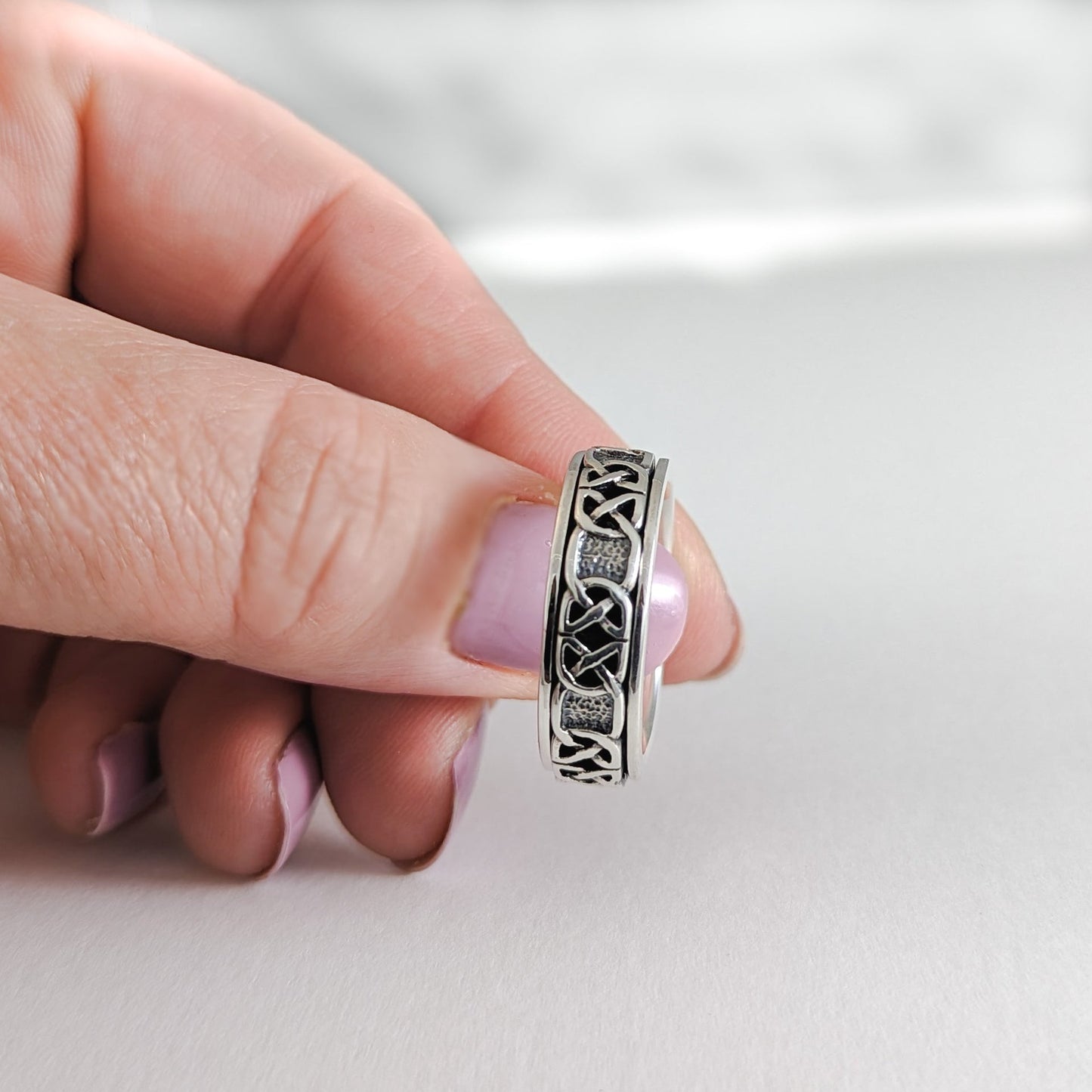 Never Ending Knot Spinner Ring in Sterling Silver Unisex