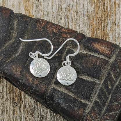 Raised Lotus Flowers on Shiny Discs Earrings in Sterling Silver