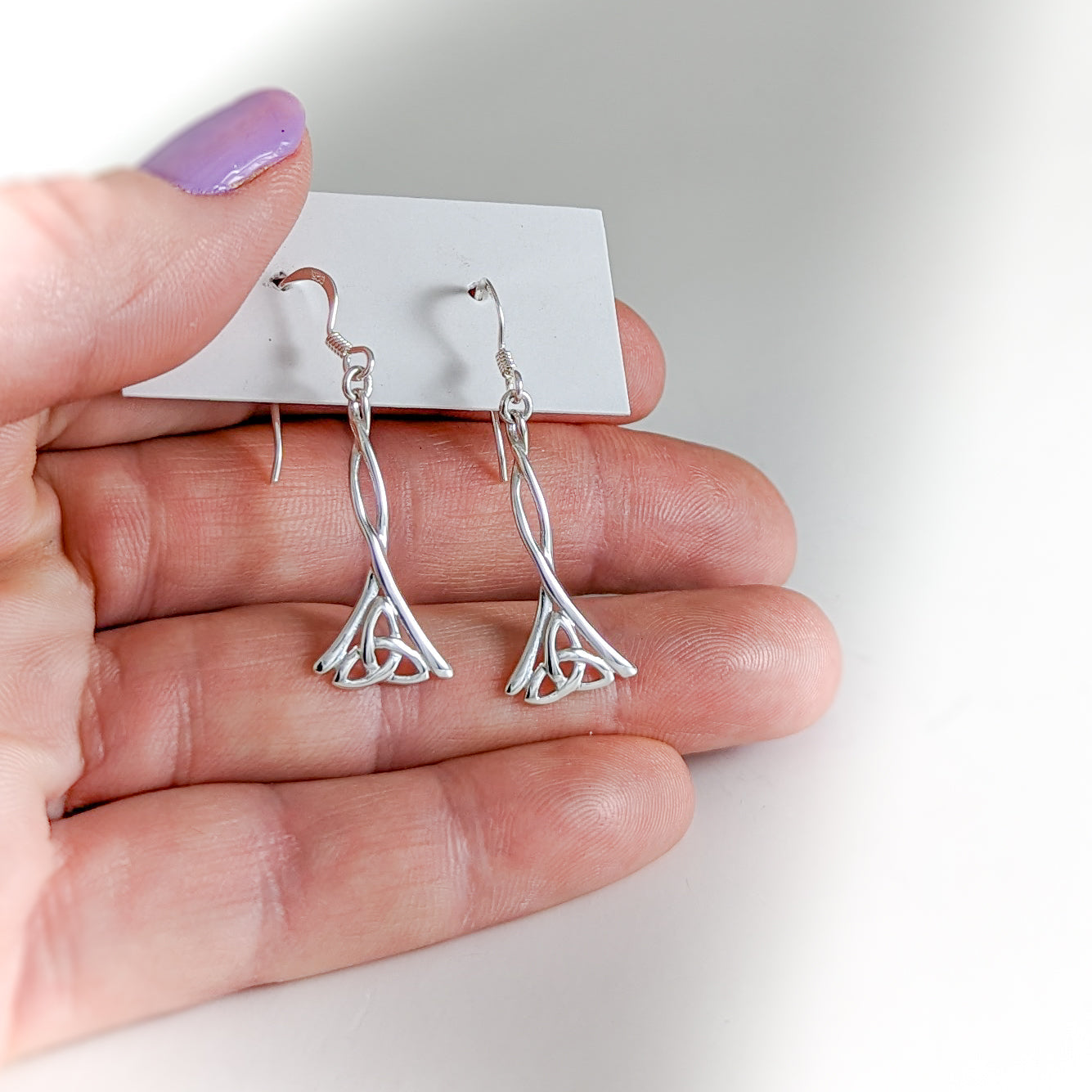 Dangling Trinity Knot Earrings in Sterling Silver