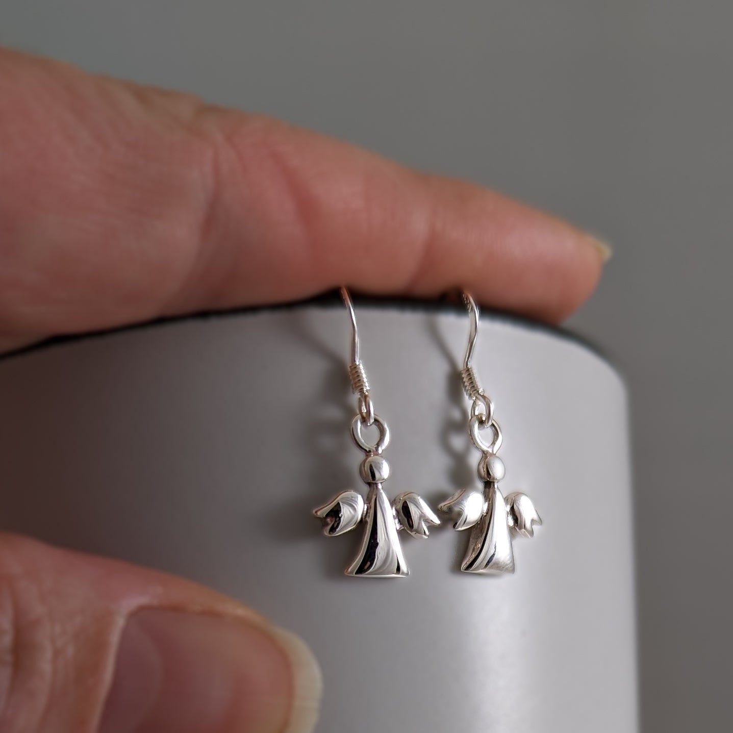 Tiny Shiny Angel Earrings in Sterling Silver